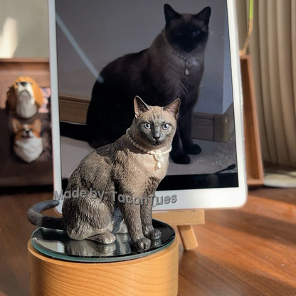 Elegant Siamese cat sculpture with pearl necklace by TaconTues, compared to real cat photo on tablet — personalized handmade pet keepsake for cat enthusiasts